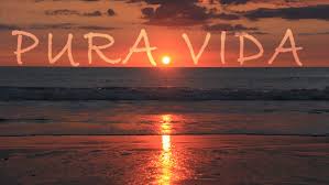 Sunset with the words Pura Vida superimposed over the sky