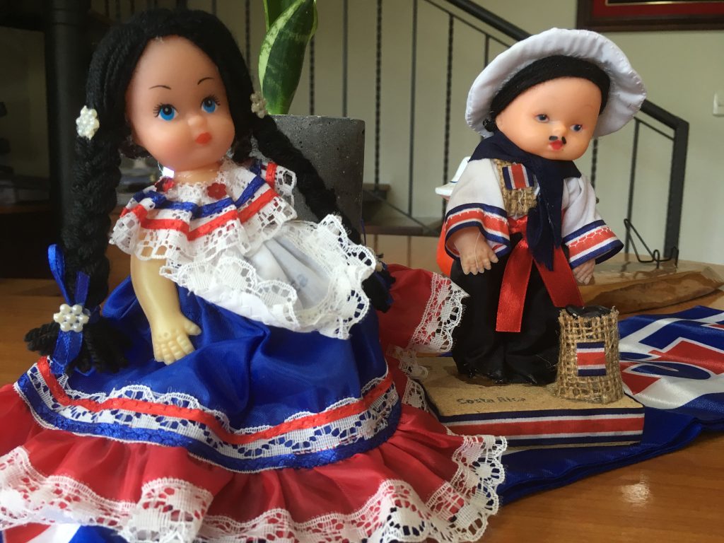 Dolls dressed up in traditional costumes for Costa Rica independence day