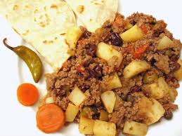 Picadillo made from potatoes with a hot pepper and tortillas
